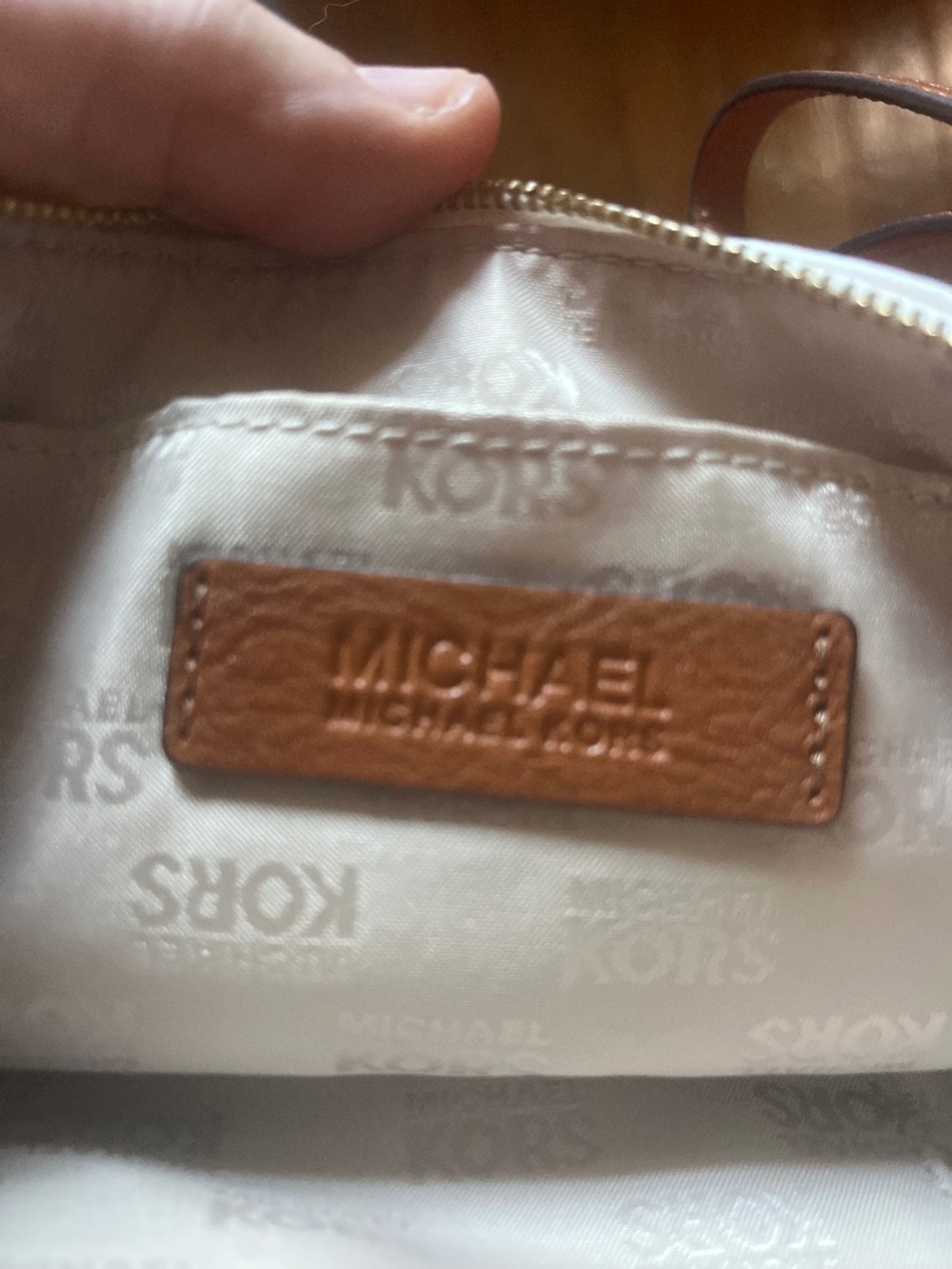 Michael Kors two-tone white and coral leather wristlet